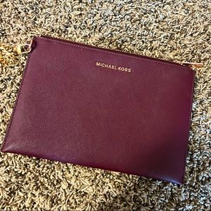 Michael Kors clutch -removable gold chain /wallet inside . Burgundy dark color